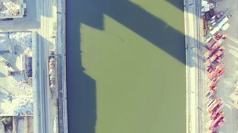 Industry river Shot with perfect reflection and typical buildings. Stock Footage 82534638