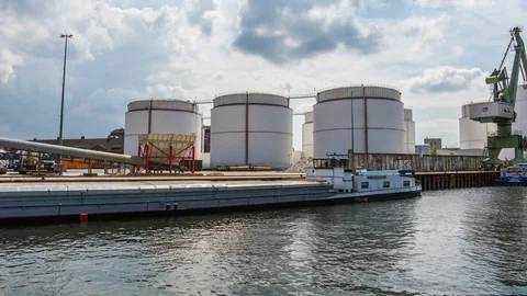 Industry silos with harbor hyperlapse tracking shot Stock Footage 76193365