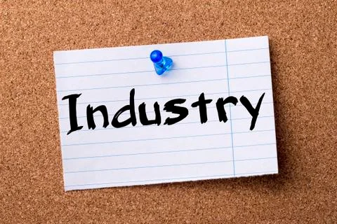 Industry - teared note paper pinned on bulletin board Stock Photos