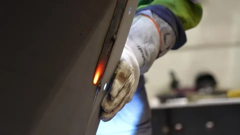 Industry worker welding metal object Stock Footage 256151109