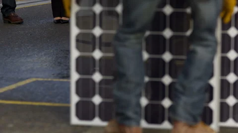 Industry workers plan solar panel installation Stock Footage 61676409