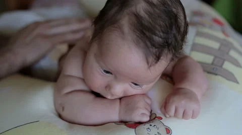 Infant  and father hands Stock Footage 61499097