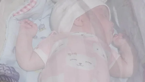 Infant baby lying  in stroller 스톡 동영상 111779720