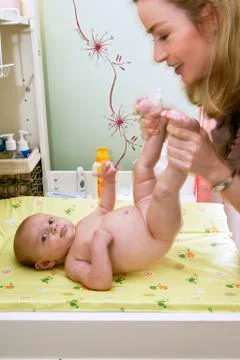 Infant being massaged Stock Photos