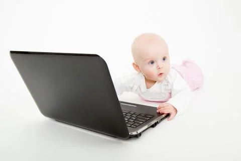 Infant with a computer Stock Photos