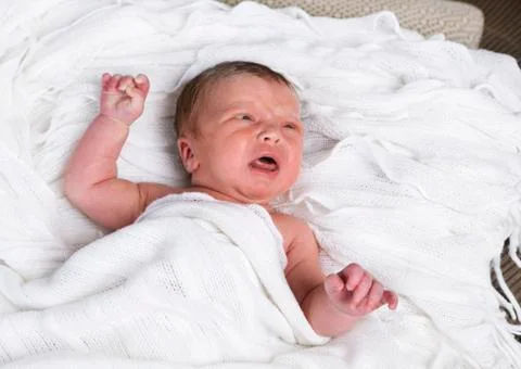 Infant cries Stock-Fotos