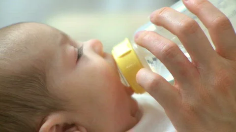 Infant Drinking from a Bottle (5 of 6) Video stock 340953