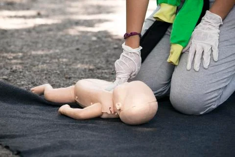 Infant dummy first aid Stock Photos