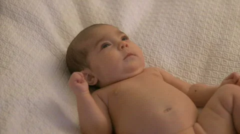 Infant Laying on a Bed (4 of 9) Stock Footage 340673