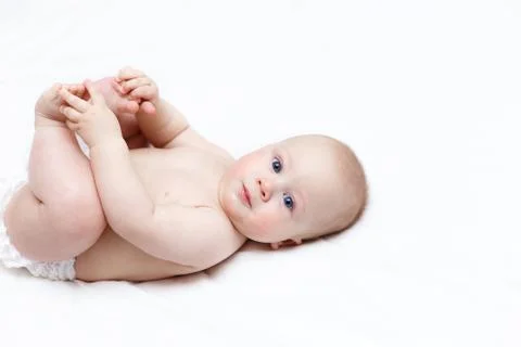 Infant lying on a changing table at home Foto stock