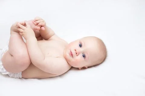 Infant lying on a changing table at home Stock-Fotos