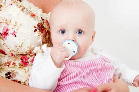 Infant with a pacifier Foto stock