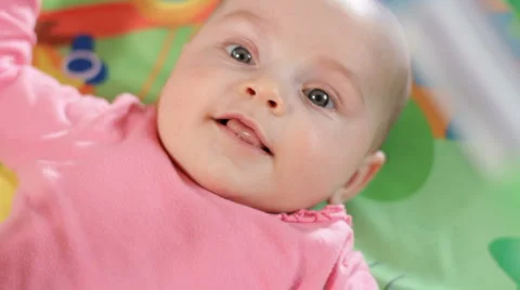 Infant on a play gym 5 Stock Footage 1075343