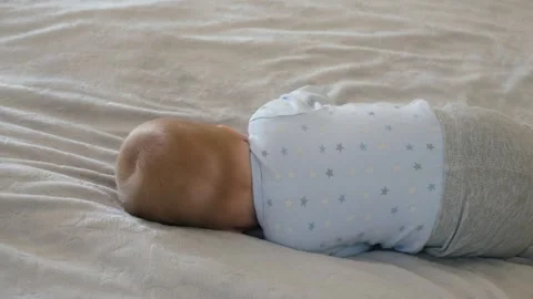 Infant practices rolling Stock Footage 339199806