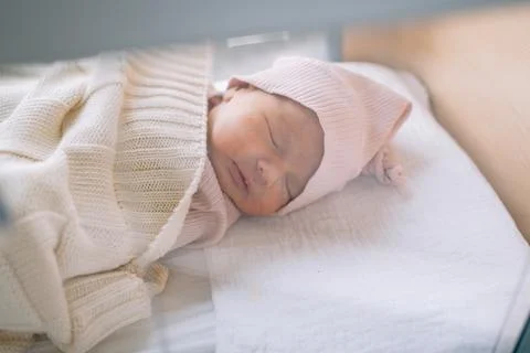 Infant Sleeping on Bed Stock Photos
