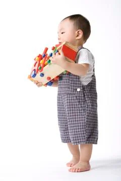 Infant with toy Stock Photos