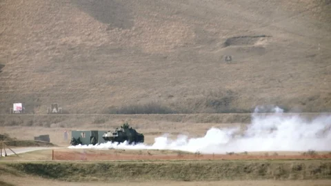 Infantry in action shot from a distance Stock Footage 101420018
