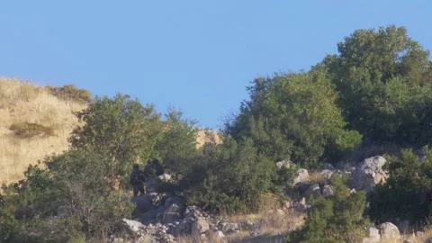 Infantry soldiers in drill on mountain Stock Footage 137555161
