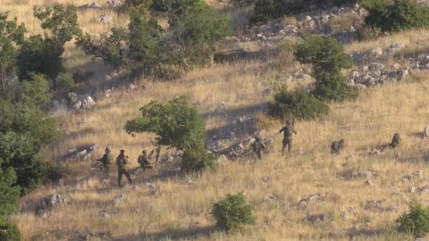 Infantry soldiers practicing with live rounds Stock Footage 137554818