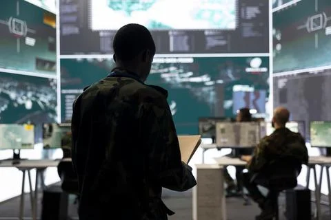 Infantry unit soldier overseeing intelligence gathering activity Stock Photos