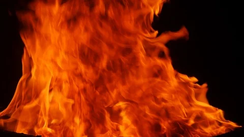 Inferno fire in slow motion isolated on black Stock Footage 99046002