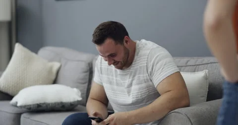 Infidelity, couple and caught cheating on phone with fight, conflict or argument Stock Footage 261671286
