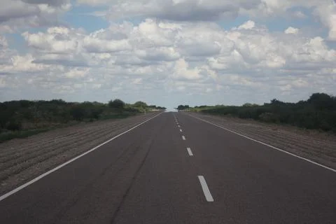 Infinite desert vanishing perspective road Stock Photos