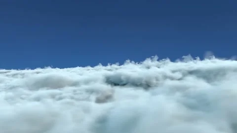 Infinite Fly Above the Cinematic Clouds Background Seamless Loop v04 Stock Footage 219255894