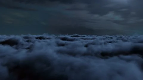 Infinite Fly Through the Cinematic Dark Night Clouds Background Seamless Loo Stock Footage 219423608