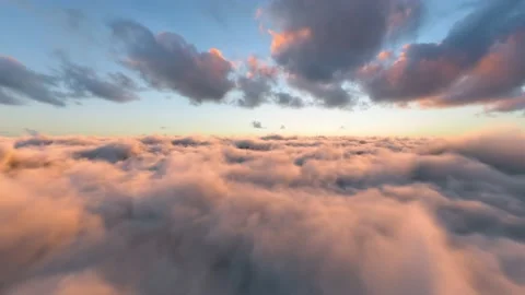 Infinite Fly Through the Cinematic Dusk Clouds Sunset Background Seamless Lo Stock Footage 219378482