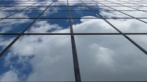 Infinite Plane Perspective of Mirrored Building with Timelapse Clouds 動画素材 76864225