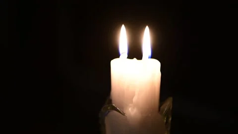Infinitely flame of two white candles in the night. Stock Footage 156757794