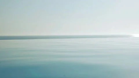 Infinity Beach Pool with Beautiful Ocean View, Sunlight, Slow Motion. Water Shim Stock Footage 199394096