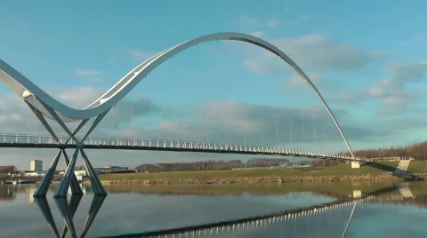Infinity Bridge, pan down to reflection. Stock Footage 1058575
