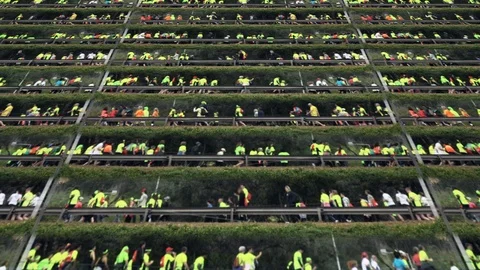 Infinity Crowd of People Running Motion Background Stock Footage 105607752