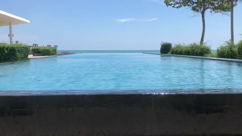 Infinity edge pool by the sea Stock Footage 131844125