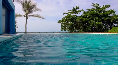 Infinity edge swimming pool Stock Footage 68691811