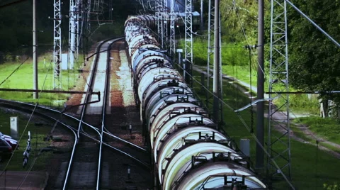 Infinity exiting railway tanks row. Shot from above Stock Footage 55758050