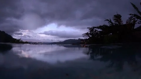 Infinity hot springs pool view during sunset  Stock Footage 257657220