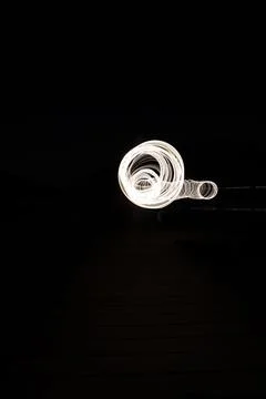 Infinity loop isolated on a black background Stock Photos