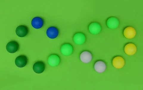Infinity pattern with spheres in green color tones. Concept circular economy Stock Photos