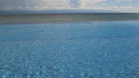 Infinity pool and ocean, blue sky Stock Footage 93731102