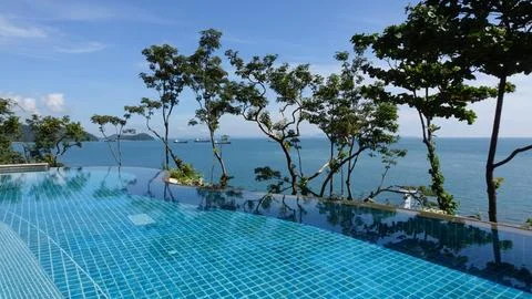 Infinity Pool with Background View of Open Sea Stock Photos