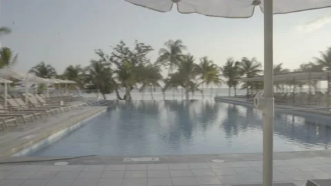 Infinity pool at beach resort Video stock 167561886
