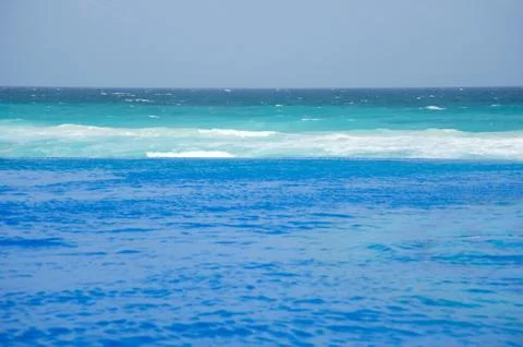 Infinity pool with the Caribbean Sea in the back Stock Photos
