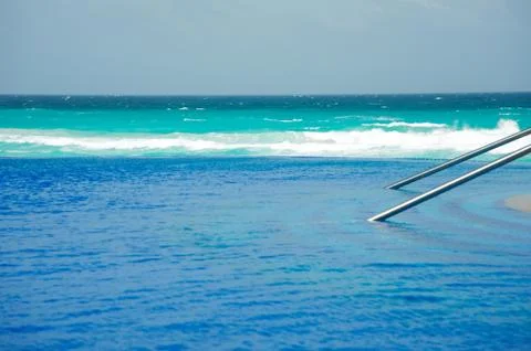 Infinity pool by the Caribbean Sea Stock Photos
