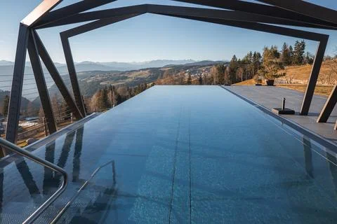 Infinity Pool with Modern Design Overlooking South Tyrolean Landscape Stock Photos