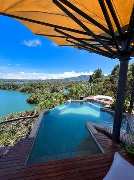Infinity pool with nature landscape in background Foto stock