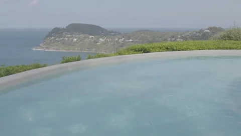 Infinity Pool With Ocean and Headland View Overlooking Sydney Coastline Stock Footage 345725595