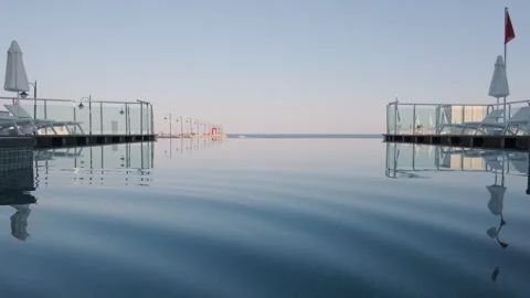 Infinity Pool Overlooking the Calm Sea Stock Footage 282937655